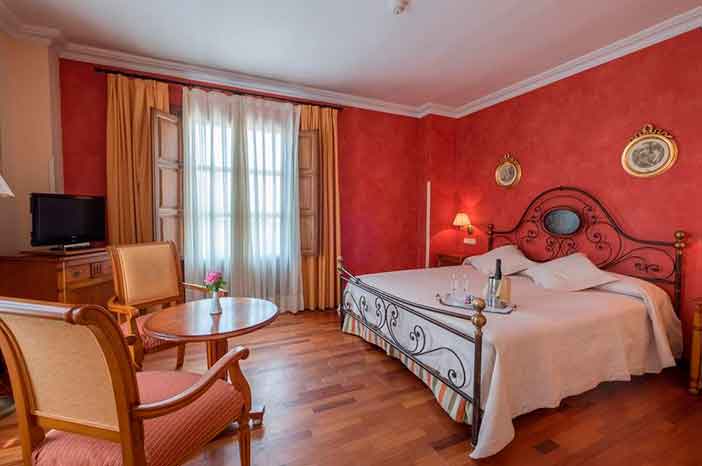 El hotel Condesa de Chinchón tiene habitaciones ideales para tus escapadas cerca de Madrid en pareja