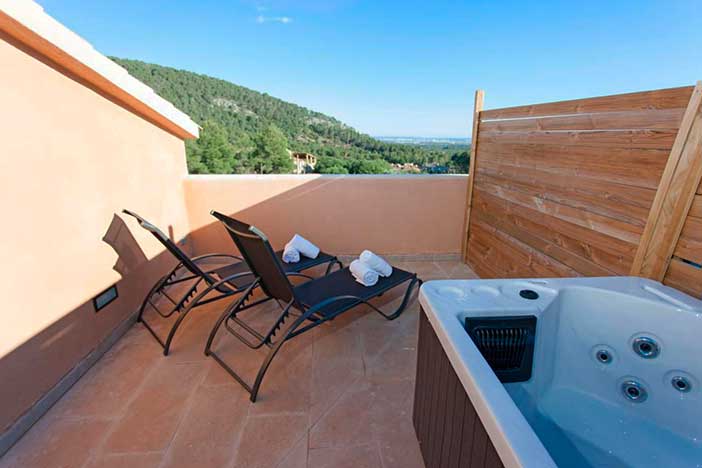 Es Corte Vell es un hotel con jacuzzi en la habitación en Mallorca muy moderno
